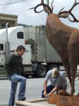 Councillor Case and artist Braden Kiefiuk alongside the Majestic Metal Art deer sculpture in Enderby