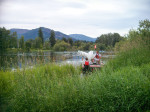 new drinking water buoy gets hoisted into water by dive team in Enderby BC