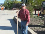 Bill Doorn Sweeping the Highway Sidewalk at Enderby Community Clean Up in 2015 02