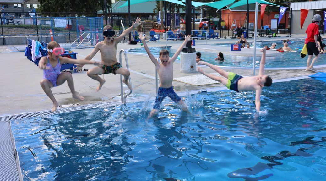 Four kids silly jumps