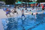 Four kids silly jumps