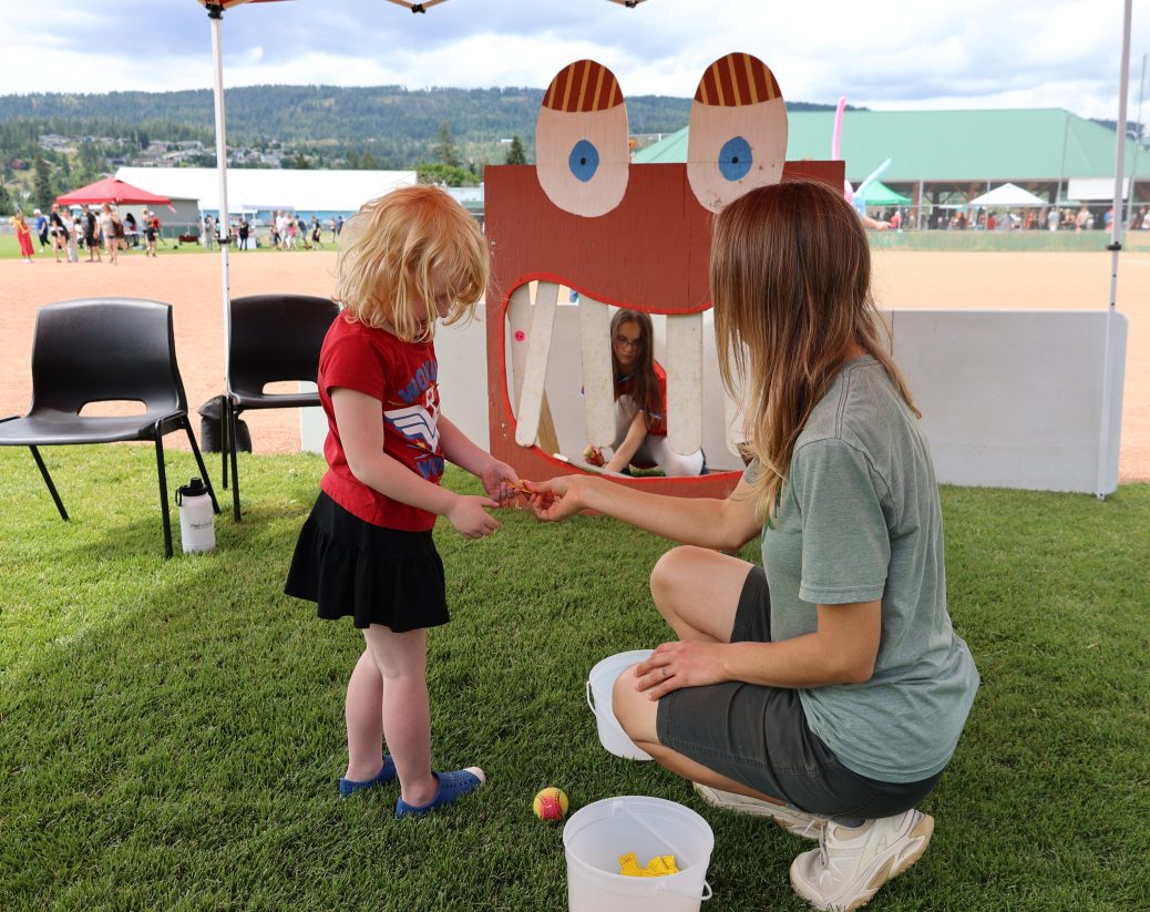 Girl getting Fun Zone tickets