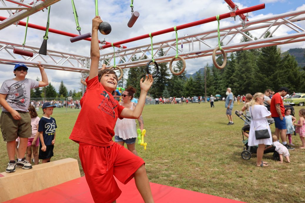 Smiling Boy on Ninja rings